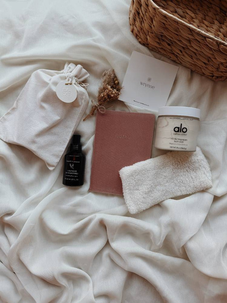 A care gift with a magnesium soak, pillow mist, eye pillow, journal and handwritten note